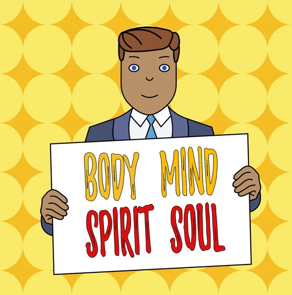 Conceptual hand writing showing Body Mind Spirit Soul. Business photo text Personal Balance Therapy Conciousness state of mind Smiling Man Holding Suit Poster Board in Front of Himself.