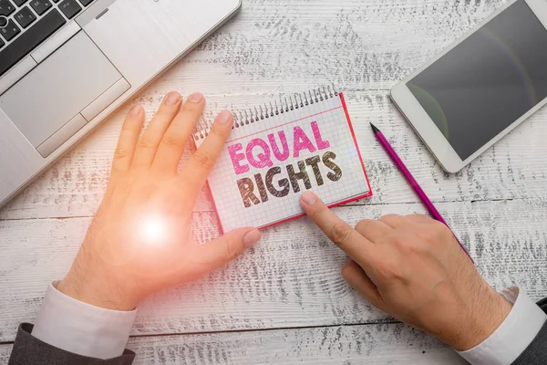 Handwriting text Equal Rights. Concept meaning Equality before the law when all showing have the same rights.