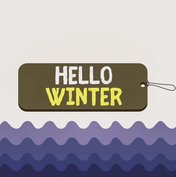 Escritura manual conceptual que muestra Hello Winter. Texto de la foto de negocios temporada más fría del año en zonas polares y templadas Etiqueta etiqueta placa rectángulo en forma de cadena colorido fondo . —  Fotos de Stock