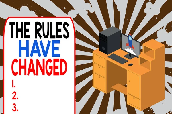 Text sign showing The Rules Have Changed. Conceptual photo the agreement or Policy has a new set of comanalysisds Working desktop station drawers personal computer launching rocket clouds. — 스톡 사진