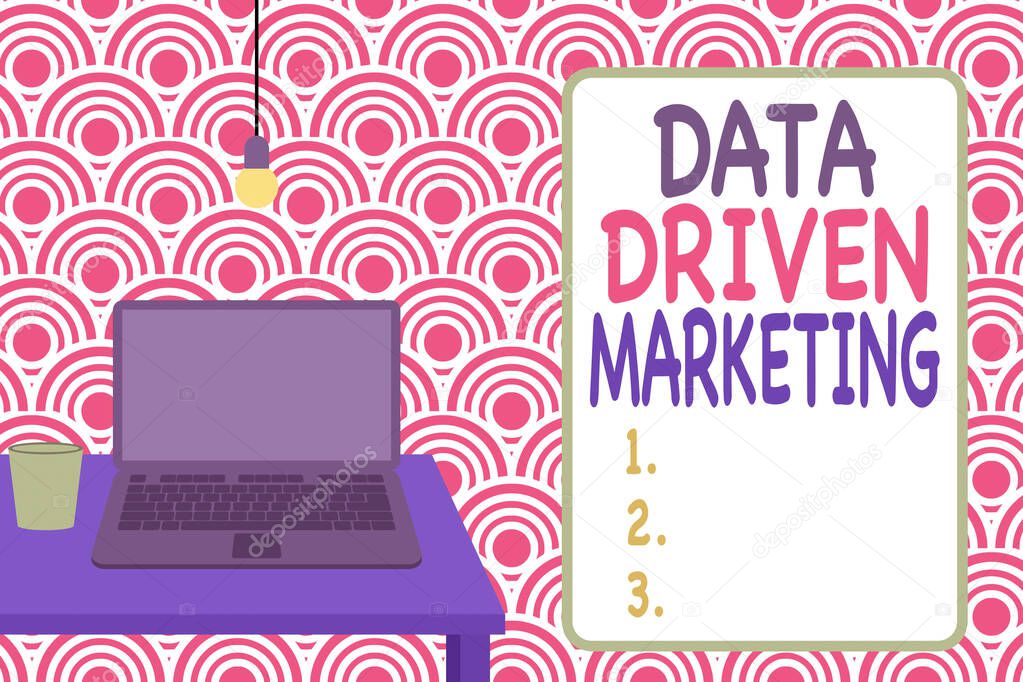 Conceptual hand writing showing Data Driven Marketing. Business photo showcasing Strategy built on Insights Analysis from interactions Front view laptop lying on wooden desktop light bulb glass.