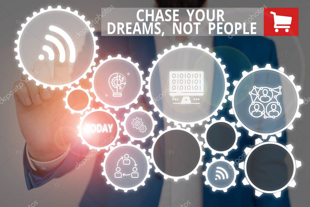 Text sign showing Chase Your Dreams Not People. Conceptual photo Do not follow others chasing goals objectives Male human wear formal work suit presenting presentation using smart device.