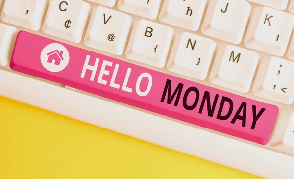 Writing note showing Hello Monday. Business photo showcasing greetings or welcoming the first day of the work week White pc keyboard with note paper above the white background. — Stock Photo, Image