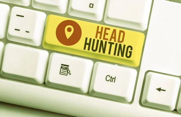 Text sign showing Head Hunting. Conceptual photo process of recruitment of a prospective or potential employee White pc keyboard with empty note paper above white background key copy space.