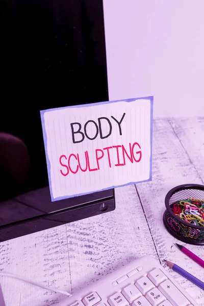 Texte d'écriture de mots Body Sculpting. Concept d'entreprise pour l'activité de l'augmentation du corps s est visible tonus musculaire Note papier collé à l'écran d'ordinateur noir près du clavier et stationnaire . — Photo