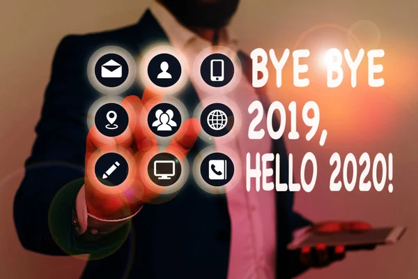 Nota de escritura que muestra Bye Bye 2019 Hola 2020. Foto de negocios que muestra despedida el año pasado y da la bienvenida a otra buena . —  Fotos de Stock