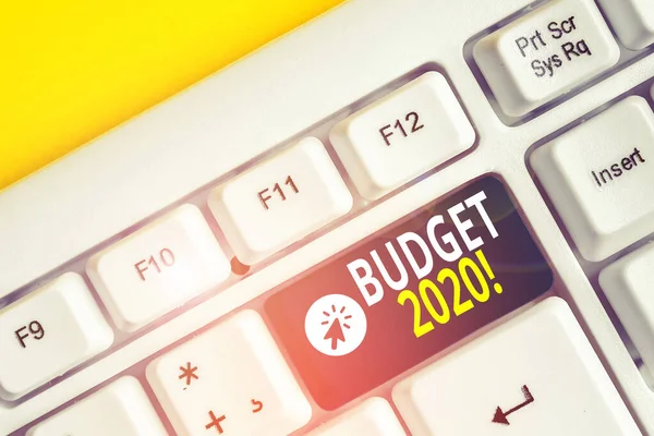 Word writing text Budget 2020. Business concept for estimate of income and expenditure for next or current year White pc keyboard with empty note paper above white background key copy space. — Stock Photo, Image