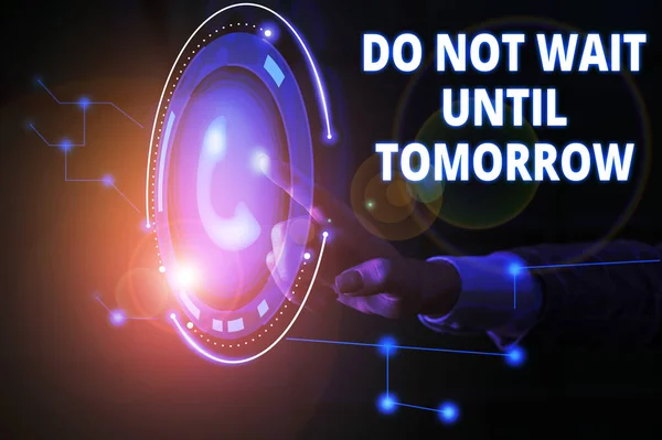 Handwriting text Do Not Wait Until Tomorrow. Concept meaning needed to do it right away Urgent Better do now Lady presenting hand blue glow futuristic modern technology tech look contact.