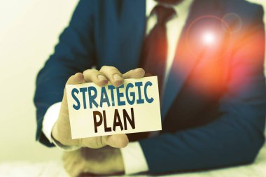 Stratejik Plan yazma metin yazma. Kavram istenilen bir gelecek insan öngörülen sistematik bir süreç anlamına gelir onun önünde kopya alanı ile boş kağıt tutar Uzay.