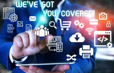 Word yazma metni We Ve Got You Covered. Akıllı cihaz kullanarak sunum sunan Erkek insan giyim resmi iş elbisesi ne olursa olsun kazanılmış ya da sağlanan için İş konsepti.