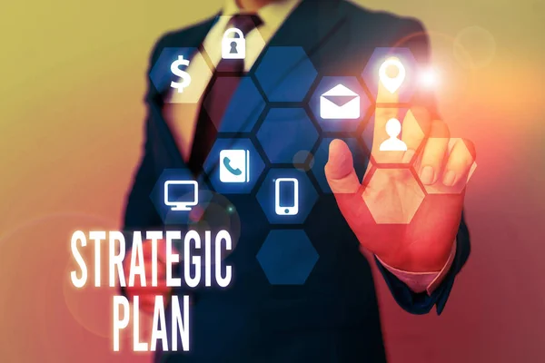 Writing note showing Strategic Plan. Business photo showcasing a systematic process of envisioning a desired future. — Stock Photo, Image