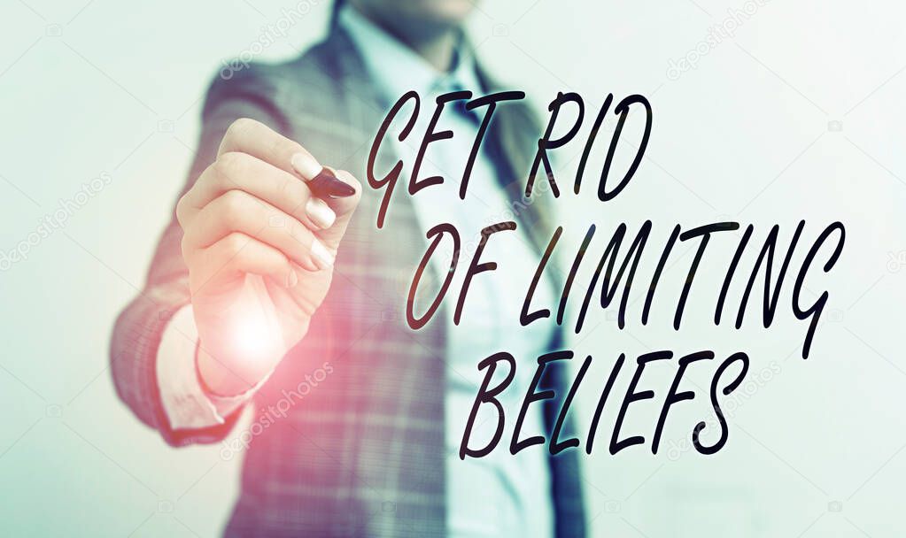 Conceptual hand writing showing Get Rid Of Limiting Beliefs. Business photo text remove negative beliefs and think positively Business woman pointing in empty space with pen.