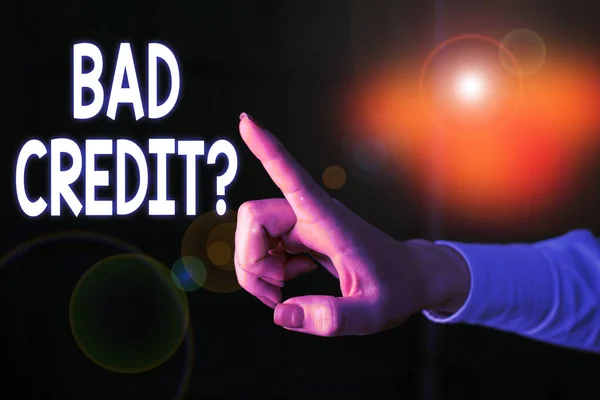 Writing note showing Bad Creditquestion. Business photo showcasing inabilityof a demonstrating to repay a debt on time and in full Finger pointing in the Dark with hand pointing in the copy space. — Stock Photo, Image
