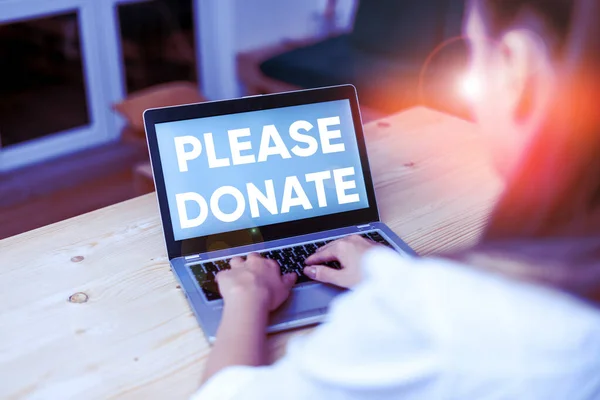 Conceptual hand writing showing Please Donate. Business photo text Supply Furnish Hand out Contribute Grant Aid to Charity woman with laptop smartphone and office supplies technology.