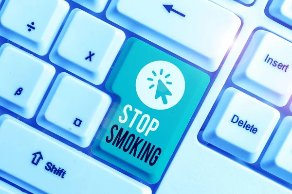 Writing note showing Stop Smoking. Business photo showcasing Discontinuing or stopping the use of tobacco addiction White pc keyboard with note paper above the white background. — Stock Photo, Image