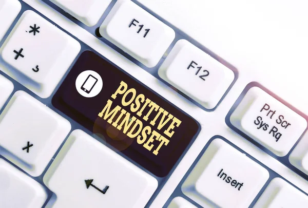 Writing note showing Positive Mindset. Business photo showcasing mental attitude in wich you expect favorable results White pc keyboard with note paper above the white background. — Stock Photo, Image