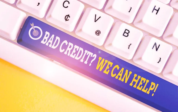 Handwriting text writing Bad Credit Question We Can Help. Concept meaning offering help after going for loan then rejected White pc keyboard with empty note paper above white background key copy space