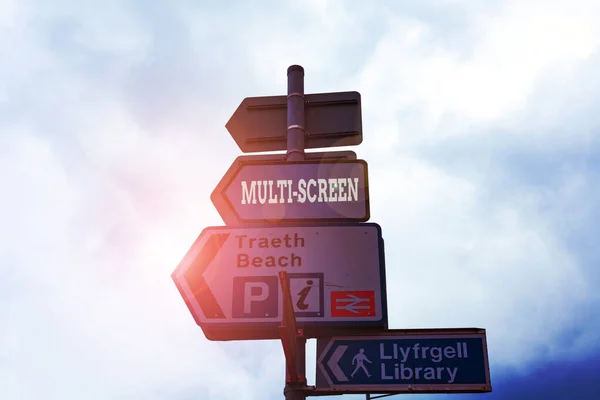 Text sign showing Multi Screen. Conceptual photo Having or involving several screen especially in a cinema Empty street signs on the crossroads with blank copy space.