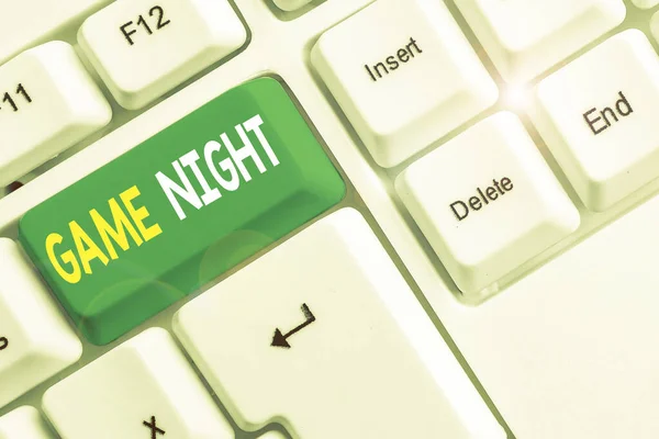 Word writing text Game Night. Business concept for event in which folks get together for the purpose of getting laid White pc keyboard with empty note paper above white background key copy space. — Stock Photo, Image