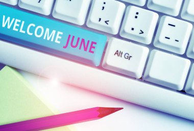 Handwriting text Welcome June. Concept meaning Calendar Sixth Month Second Quarter Thirty days Greetings White pc keyboard with empty note paper above white background key copy space. clipart