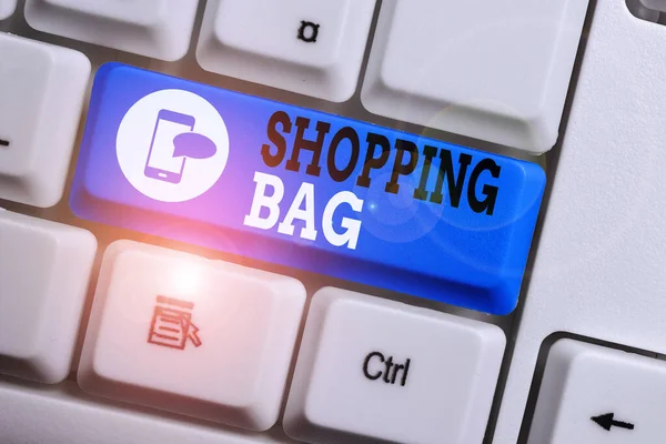 Conceptual hand writing showing Shopping Bag. Business photo text Containers for carrying demonstratingal possessions or purchases Keyboard with note paper on white background key copy space. — Stock Photo, Image