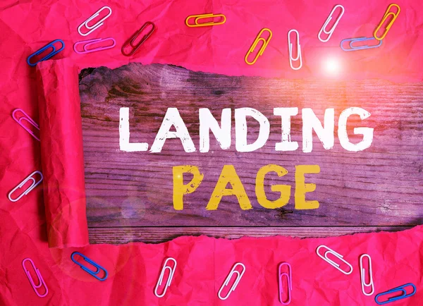 Szöveg írása Landing Page szó. Üzleti koncepció, a weboldal egy linket egy másik weblapon kattint. — Stock Fotó