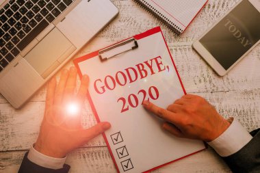 El yazısı metin Goodbye 2020. Kavramı yeni yıl eve Milestone Geçen Ay Kutlama Geçiş anlamı.