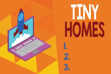 Minik Evler 'i gösteren bir not yazıyorum. İş fotoğrafları sergilenen evlerde sadece bir ya da iki oda ve ucuz roket fırlatma bulutları arka planında küçük bir giriş var. Başlangıç projesi büyüyor. Seo..