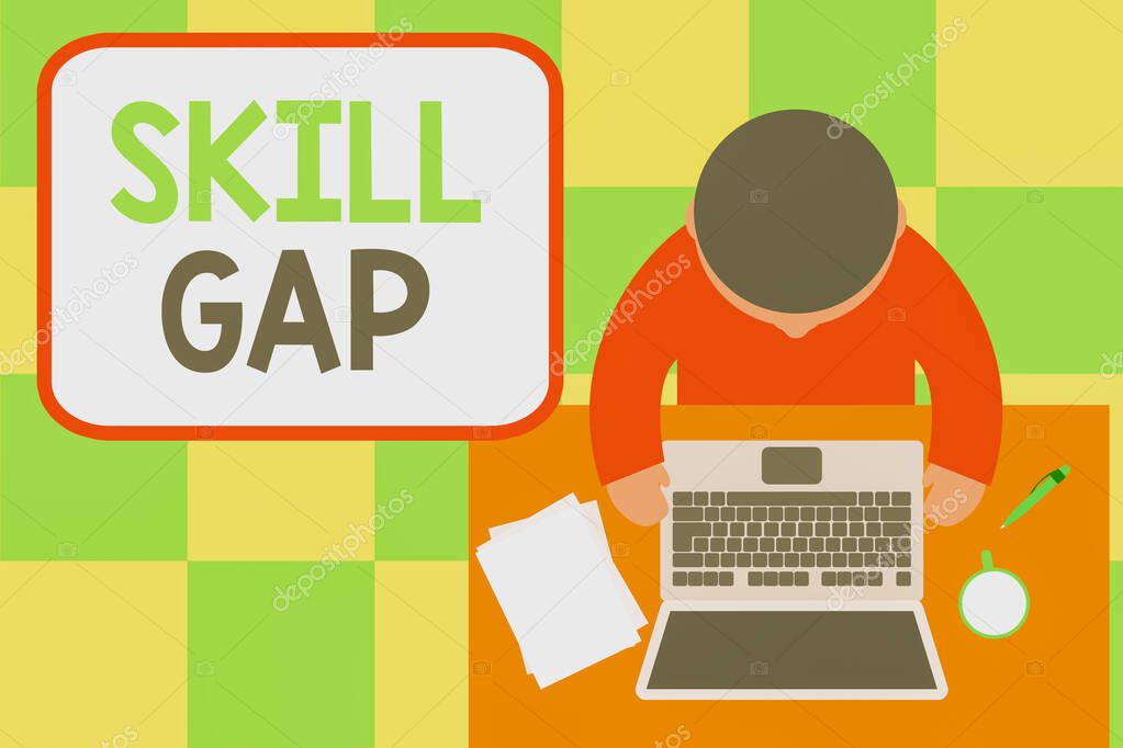 Conceptual hand writing showing Skill Gap. Business photo showcasing Refering to a demonstrating s is weakness or limitation of knowlege Upper view young man sitting table laptop coffee cup pen.
