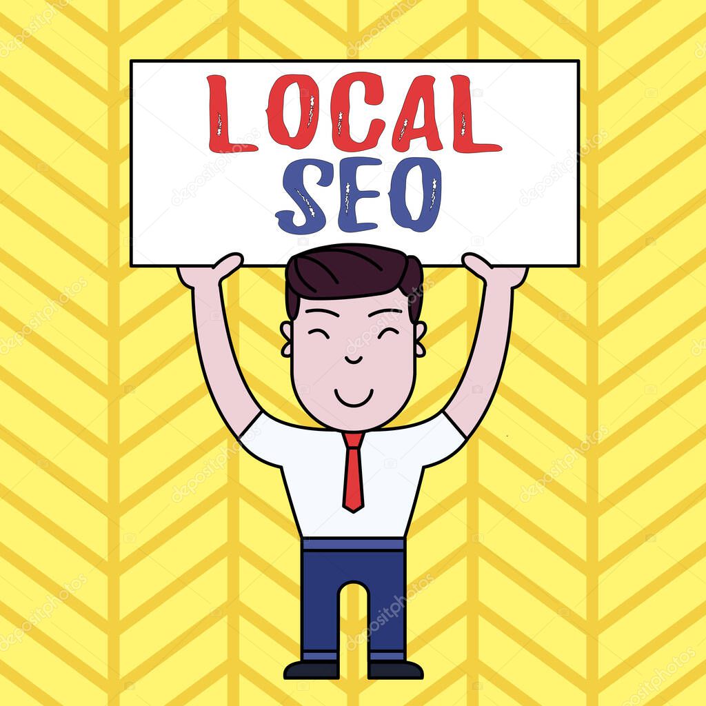 Text sign showing Local Seo. Conceptual photo This is an effective way of marketing your business online Smiling Man Standing Holding Big Empty Placard Overhead with Both Hands.