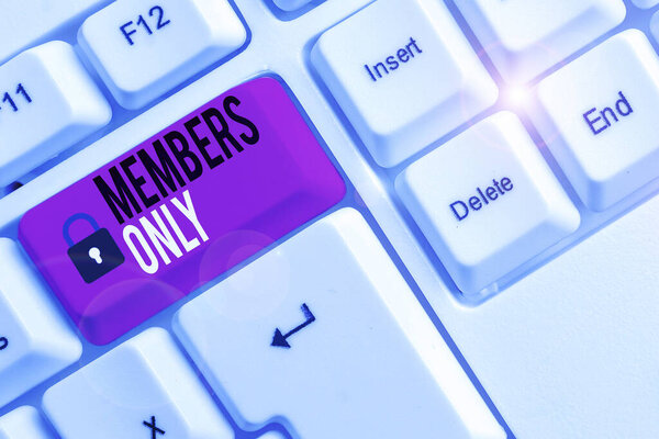 Conceptual hand writing showing Members Only. Business photo showcasing Limited to an individual belongs to a group or an organization White pc keyboard with note paper above the white background.