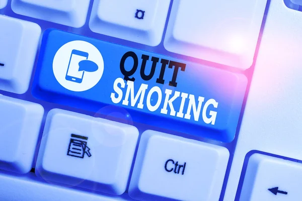 Conceptual hand writing showing Quit Smoking. Business photo text Discontinuing or stopping the use of tobacco addiction Keyboard with note paper on white background key copy space. — Stock Photo, Image