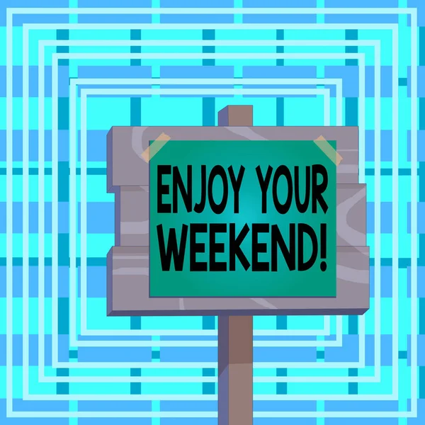 Text sign showing Enjoy Your Weekend. Conceptual photo wishing someone that something nice will happen at holiday Wood plank wooden stick pole paper note attached adhesive tape empty space. — 스톡 사진