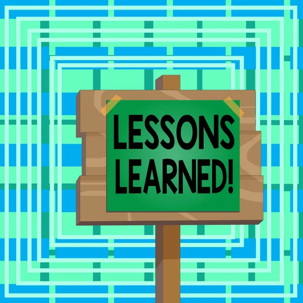 Text sign showing Lessons Learned. Conceptual photo experiences distilled project that should actively taken Wood plank wooden stick pole paper note attached adhesive tape empty space. — Stock Photo, Image