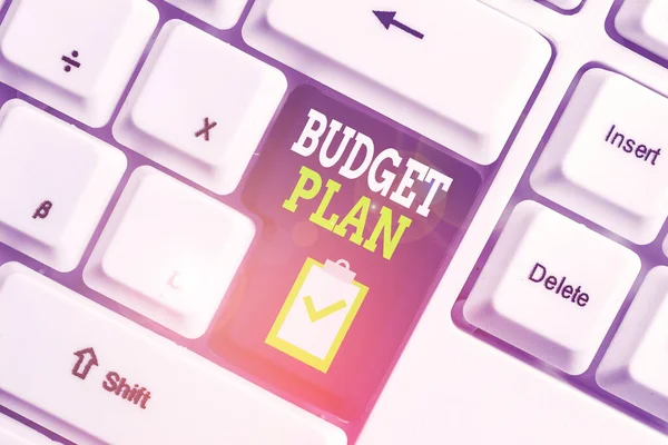Handwriting text writing Budget Plan. Concept meaning financial schedule for a defined period of time usually year White pc keyboard with empty note paper above white background key copy space.