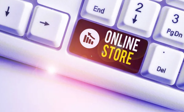 Writing note showing Online Store. Business photo showcasing A website that offers items for sale and accept credit cards White pc keyboard with note paper above the white background. — Stock Photo, Image