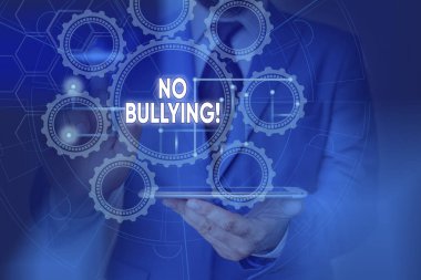 Conceptual hand writing showing No Bullying. Business photo showcasing stop aggressive behavior among children power imbalance Picture photo network scheme with modern smart device.