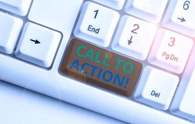 Handwriting text writing Call To Action. Concept meaning exhortation do something in order achieve aim with problem White pc keyboard with empty note paper above white background key copy space.