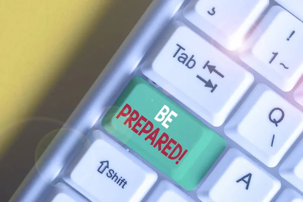 Writing note showing Be Prepared. Business photo showcasing try be always ready to do or deal with something White pc keyboard with note paper above the white background. — Stock Photo, Image