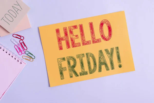 Konceptuell handstil visar Hello Friday. Företagsfoto visa upp används för att uttrycka lycka från början av fräsch vecka Kartong och skrivutrustning placerad ovanför pastell bakgrund. — Stockfoto