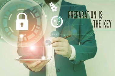 Writing note showing Preparation Is The Key. Business photo showcasing it reduces errors and shortens the activities Male human wear formal suit presenting using smart device.