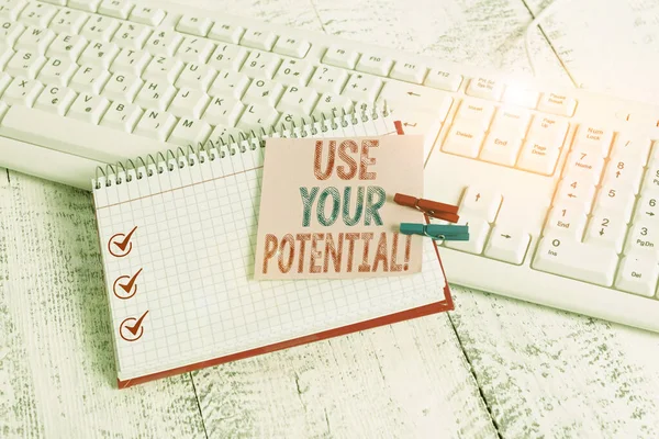 Writing note showing Use Your Potential. Business photo showcasing achieve as much natural ability makes possible notebook reminder clothespin with pinned sheet light wooden.