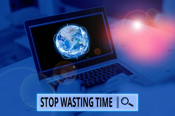 Conceptual hand writing showing Stop Wasting Time. Business photo showcasing advising demonstrating or group start planning and use it wisely Picture photo network scheme with modern smart device. Ele