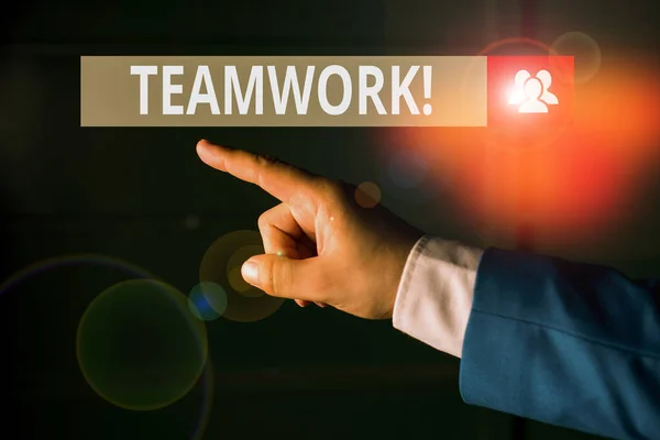 Conceptual hand writing showing Teamwork. Business photo showcasing combined action of group especially when effective and efficient Isolated hand pointing with finger. Business concept. — Stock Photo, Image