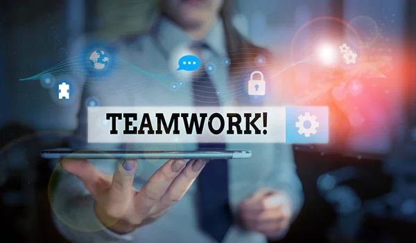 Conceptual hand writing showing Teamwork. Business photo text combined action of group especially when effective and efficient Picture photo network scheme with modern smart device. — Stock Photo, Image
