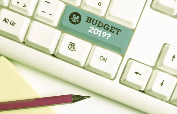 Text sign showing Budget 2019 Question. Conceptual photo estimate of income and expenditure for next year White pc keyboard with empty note paper above white background key copy space. — Stock Photo, Image