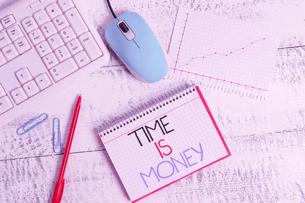 Writing note showing Time Is Money. Business photo showcasing time is a valuable resource Do things as quickly as possible Wood desk office appliance computer equipaments charts paper slot.