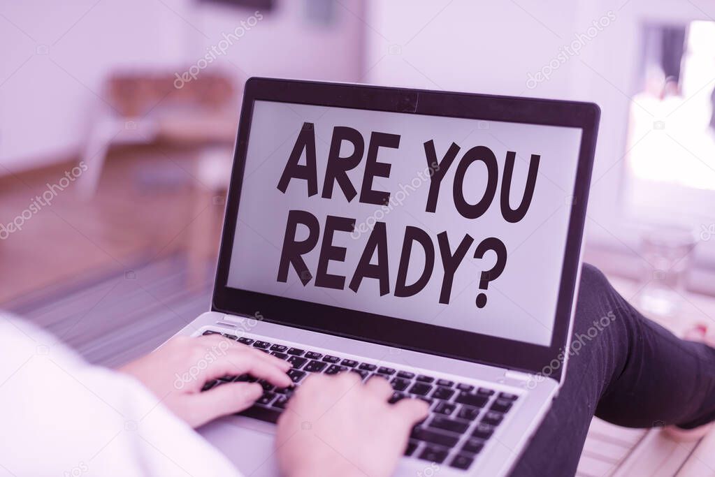 Text sign showing Are You Ready Question. Conceptual photo used telling someone start something when feel prepared woman laptop computer office supplies technological devices inside home.