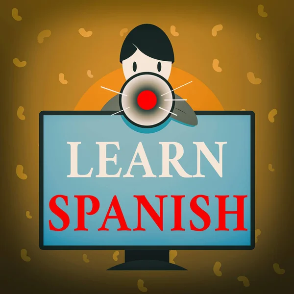 显示学习西班牙语的概念手写体。商务图片，培训西班牙语写作和说西班牙语的能力安装在电脑显示器后面讲和拿着扩音器. — 图库照片