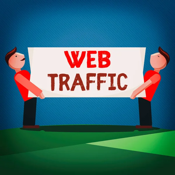 Ruční psaní textu Web Traffic. Koncepce znamená množství uživatelů webu a pokus o návštěvu měřeno na webových stránkách Dva muži stojící s obdélníkovým prázdným panelem na obou stranách. — Stock fotografie